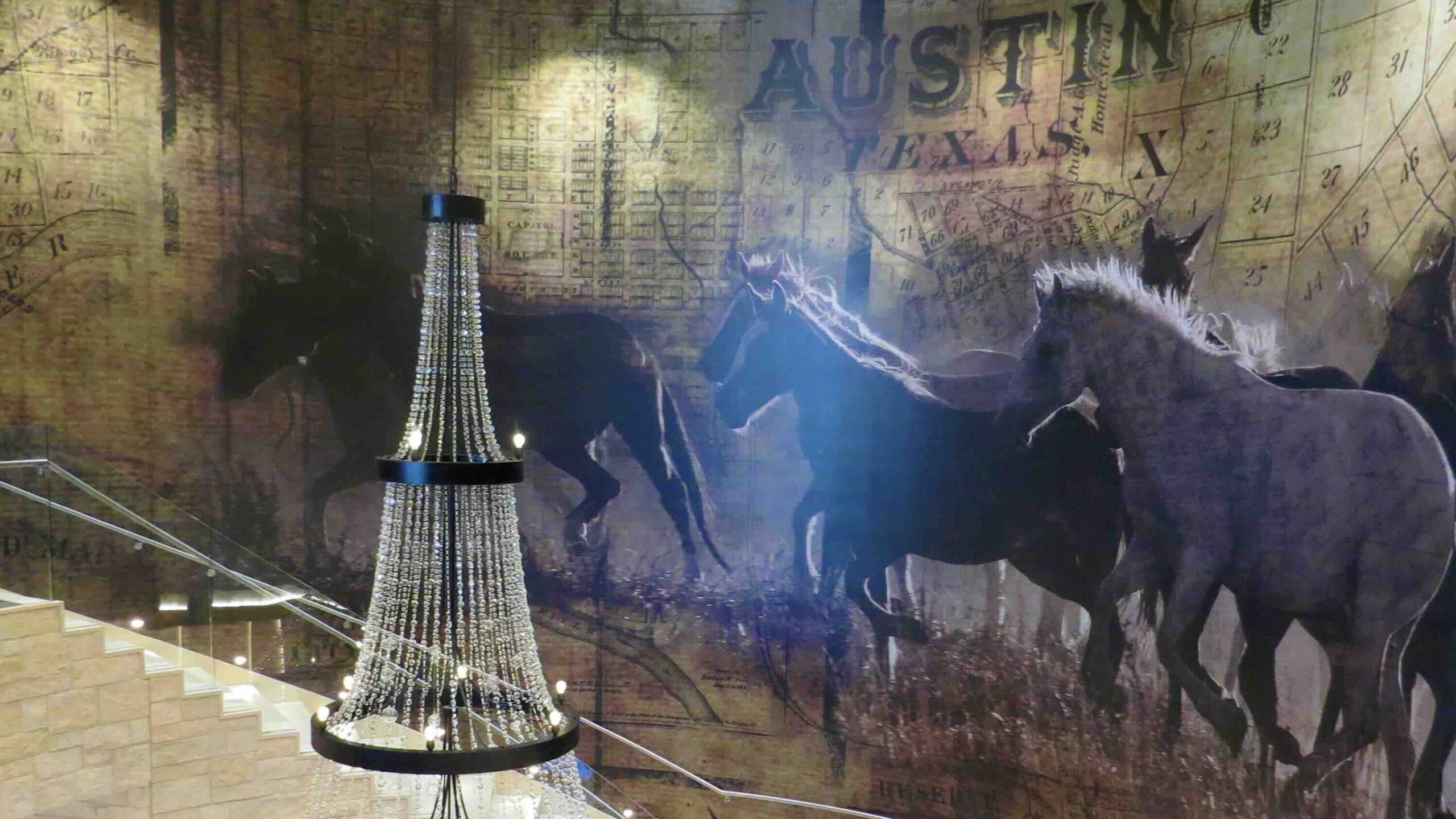 Stairwell Wild horses artwork at the Archer Hotel Austin