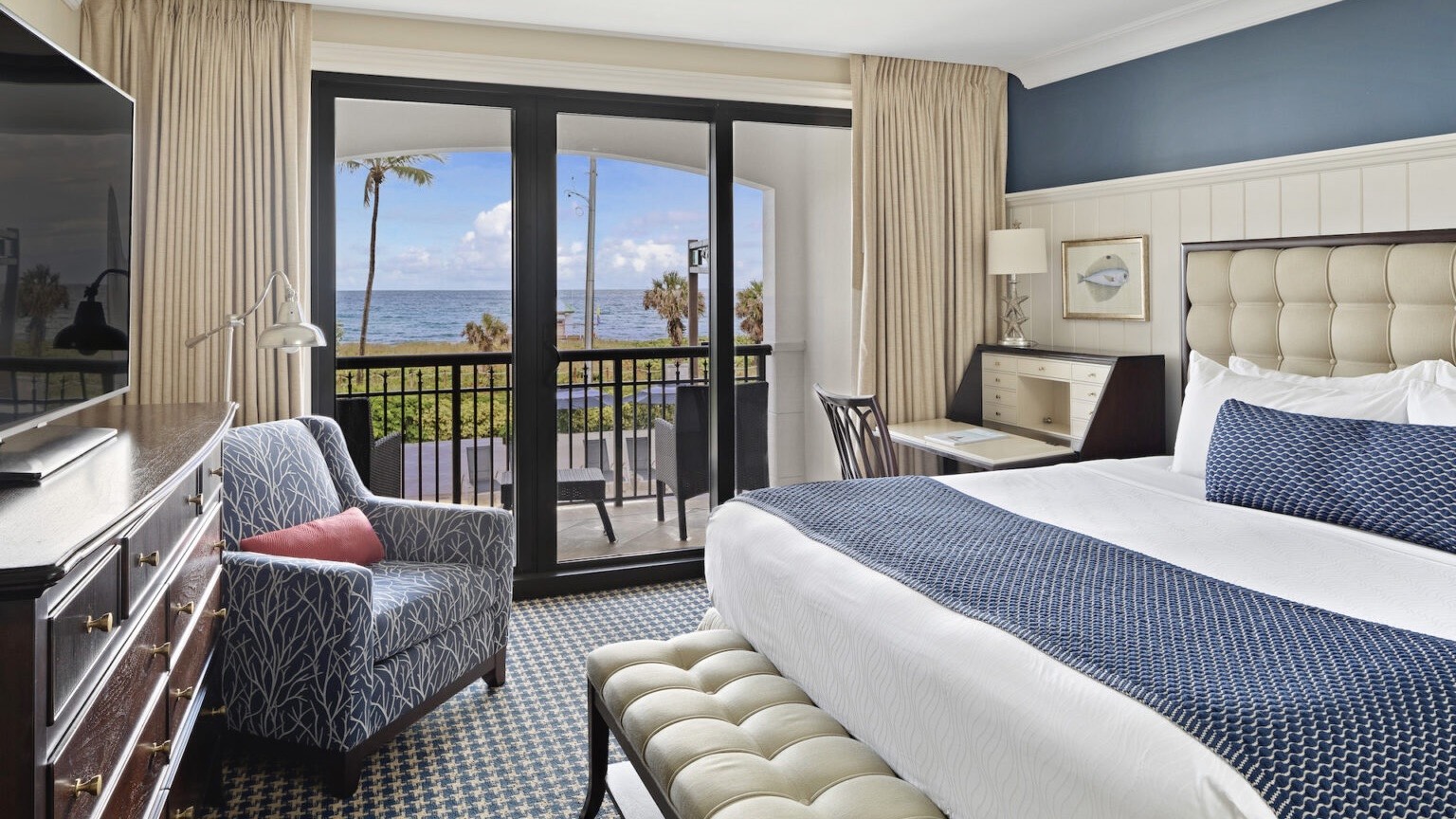 Opal Grand Oceanfront Resort & Spa bedroom with ocean view at one of the best luxury hotels in Delray Beach Florida